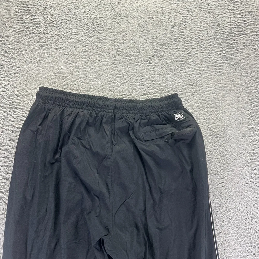 Nike SB Pant Mens S Black Nylon Jogger Tapered Mesh Lined Skateboarding Stretch